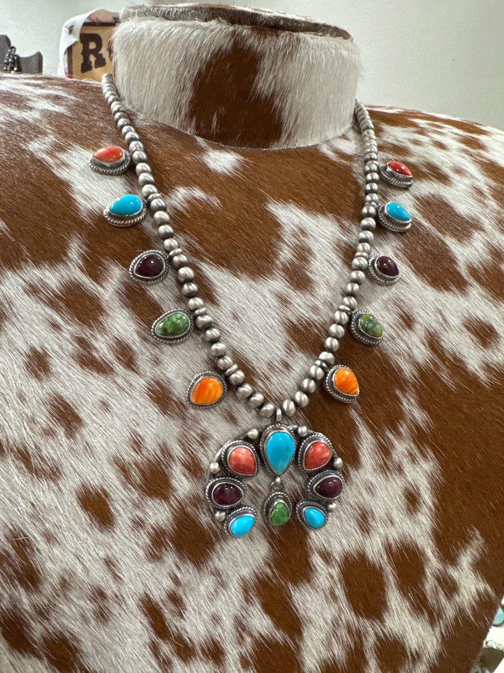 Mini Squash Blossom with Red Spiny, Orange Spiny, Sonoran Gold, Purple Spiny, and Kingman Stones by Will Sacatero