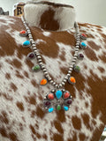 Mini Squash Blossom with Red Spiny, Orange Spiny, Sonoran Gold, Purple Spiny, and Kingman Stones by Will Sacatero