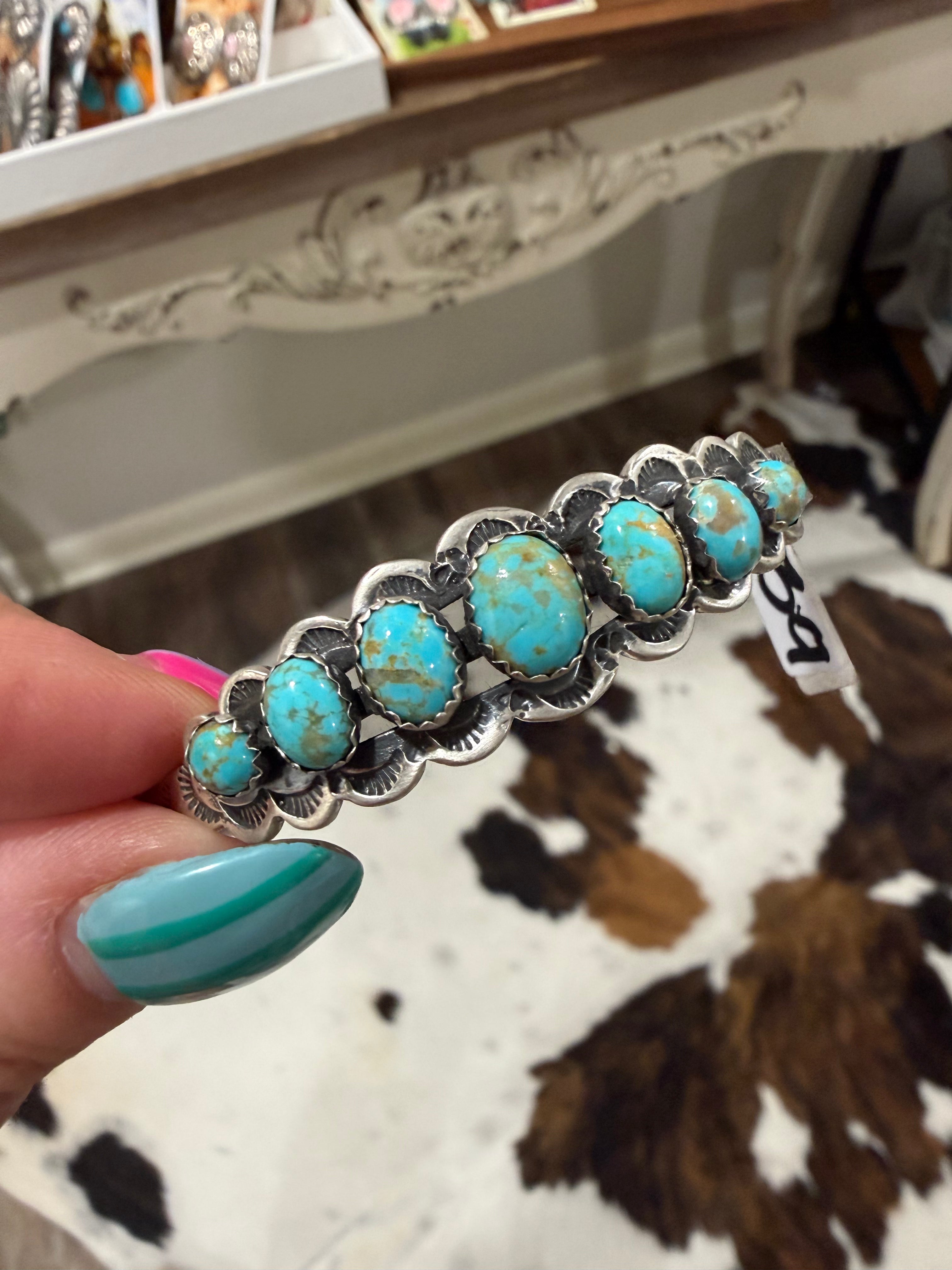 Native Made 7 Stone Cuff stamped Russel Sam